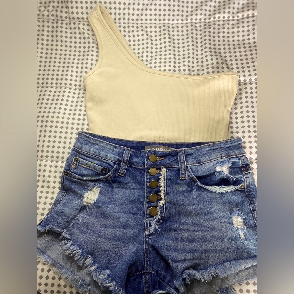 The brand of these pair of shorts are just USA the color the the pair blue Jean